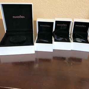 4 Pandora boxes 3 small charm and 1 bracelet